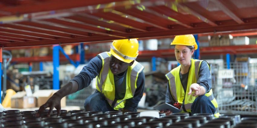Facility manager reviewing live service reporting dashboard