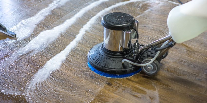 Coordinating floor care scheduling without drying-time conflicts